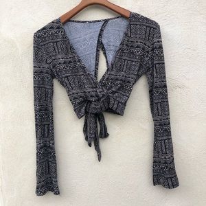 Cropped long sleeve surplace top